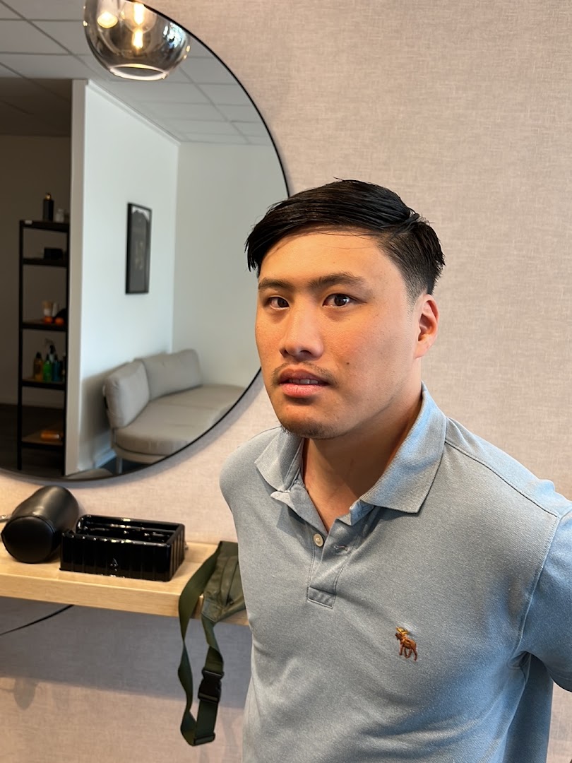 Klant van Kroeven Barber met een vers geknipte fade